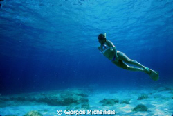 Siren in the sea by Giorgos Michailidis 